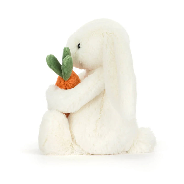 Side view of the Jellycat bashful carrot bunny.