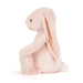 Side view of the Jellycat blossom bunny.