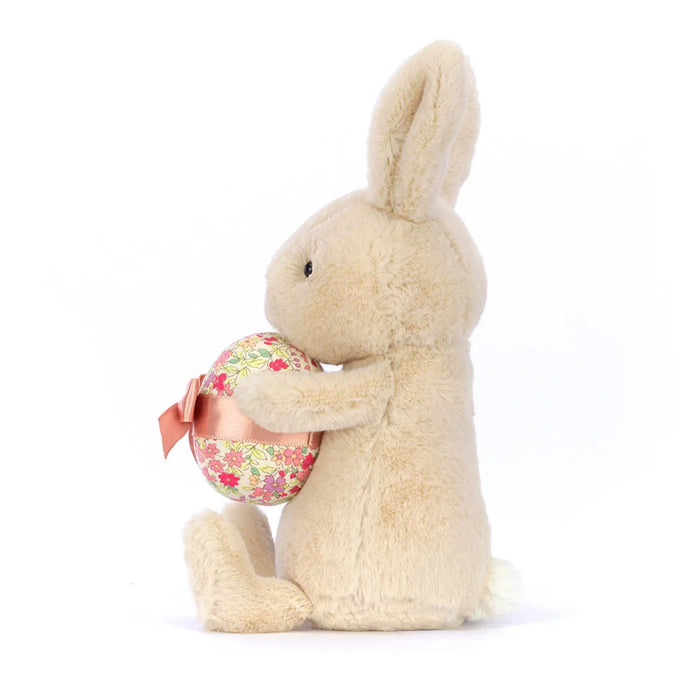 Side view of the Jellycat bonnie bunny with egg.