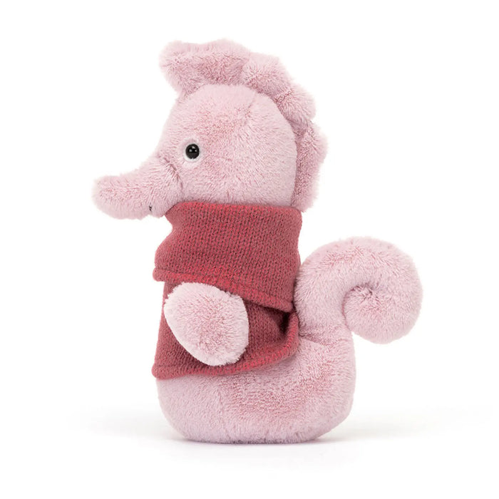 Side view of the Jellycat cosy crew seahorse.