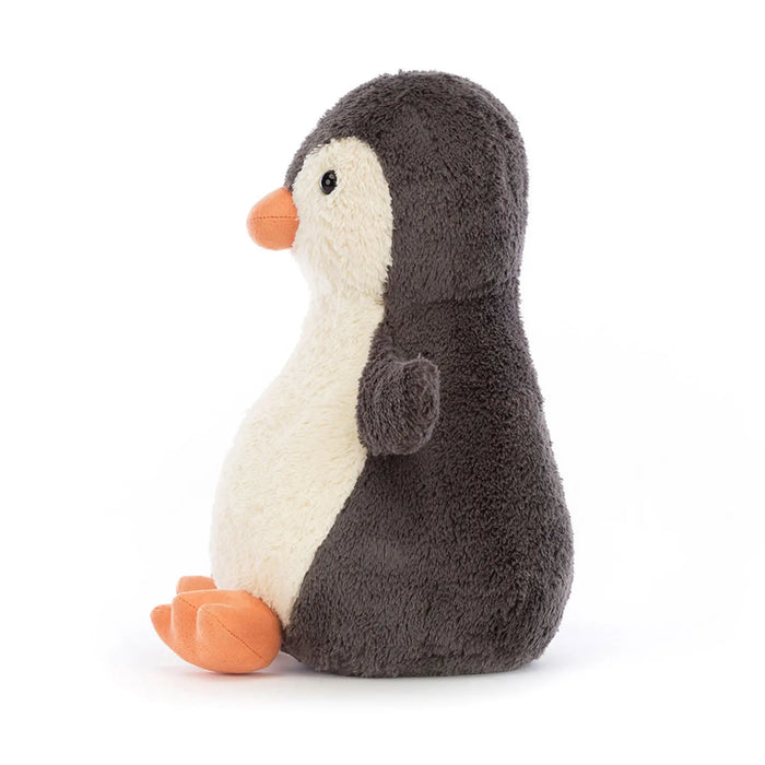 Side view of the Jellycat peanut penguin.