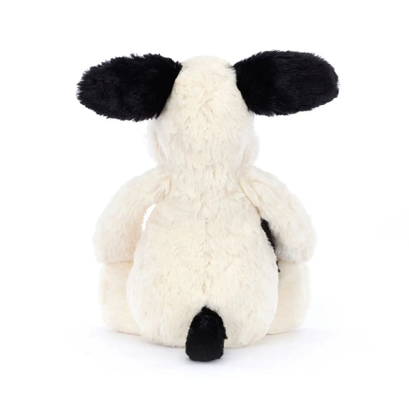Rear view of the Jellycat rufferty puppy.