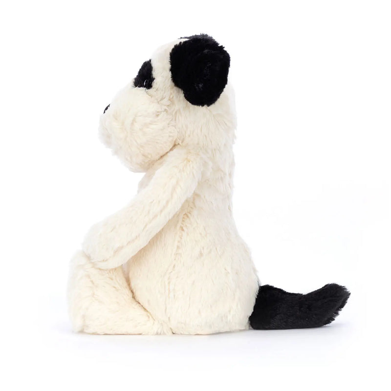 Side view of the Jellycat rufferty puppy.