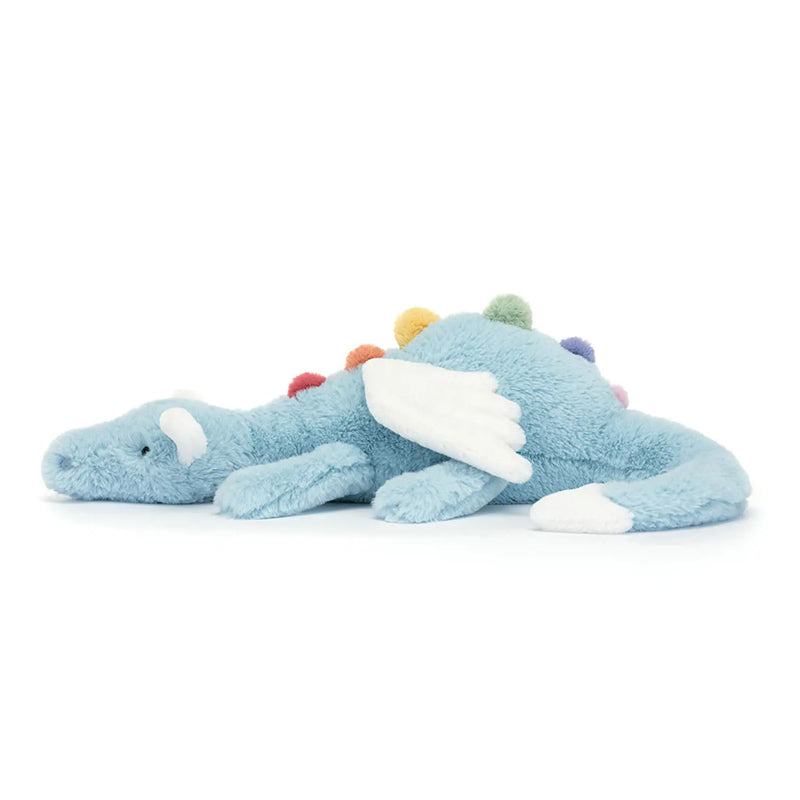 Side view of the Jellycat sky dragon.
