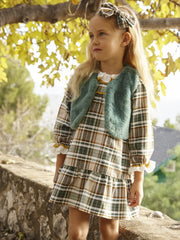 Girl wearing the Juliana faux fur gilet.