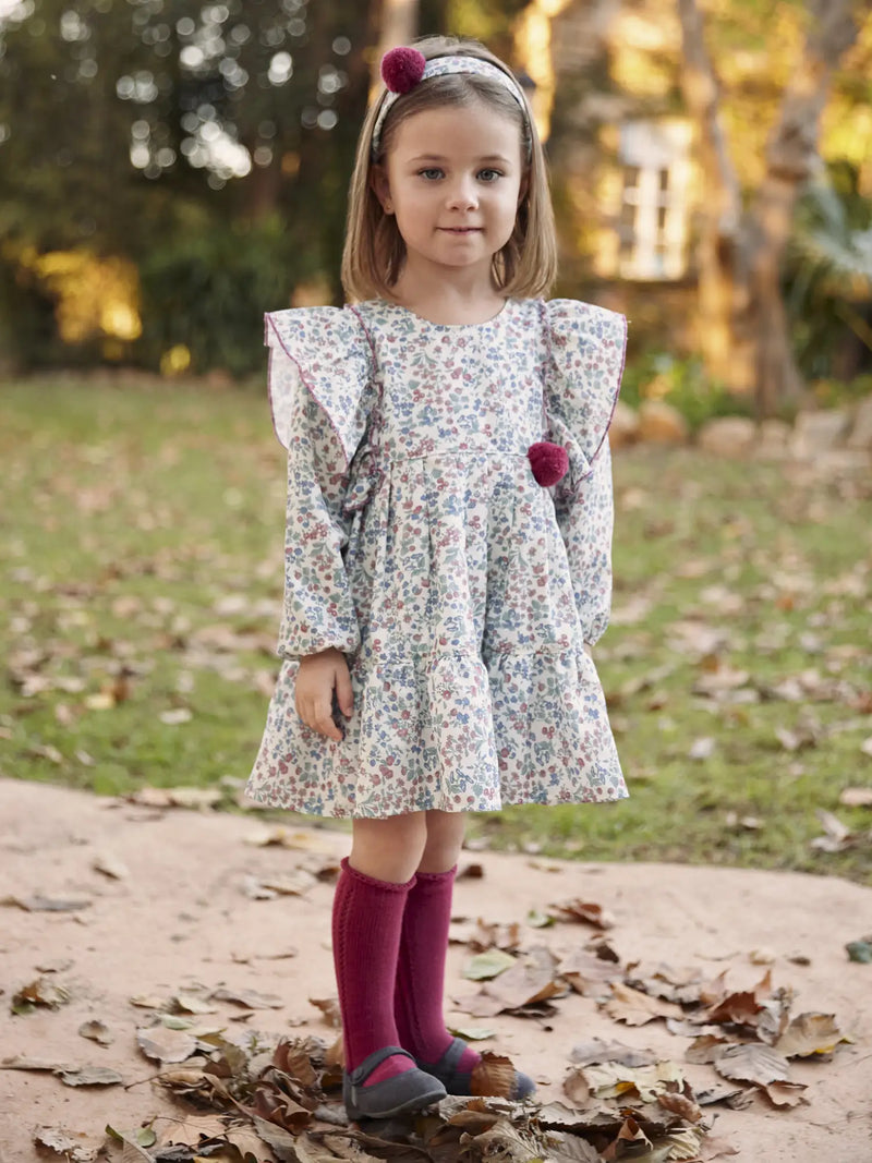 Girl modelling the Juliana floral print dress.