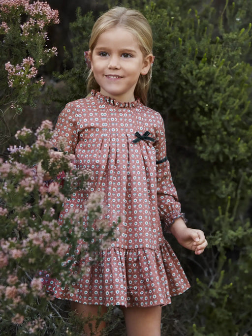 Smiling Girl modelling the Juliana floral print dress.