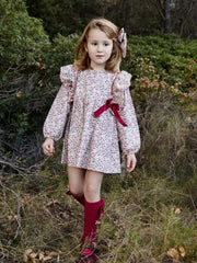 Girl wearing the Juliana floral print dress.