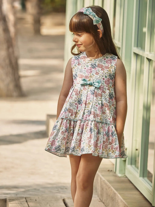 Baby girl wearing the Juliana floral print frilled dress.