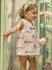 Baby girl wearing the Juliana floral print sleeveless dress.
