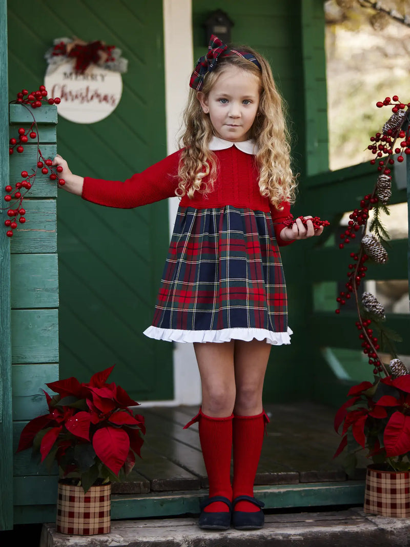 Girl modelling the Juliana knitted dress.