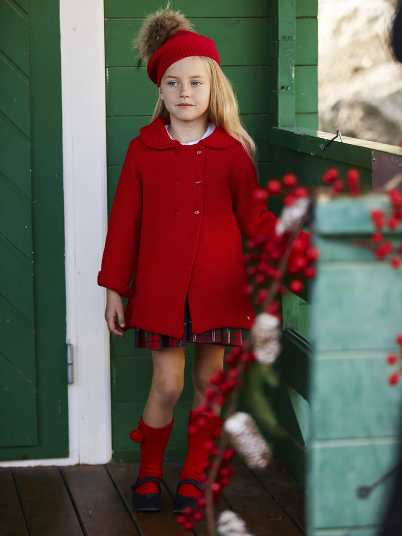 Girl modelling the Juliana knitted jacket.