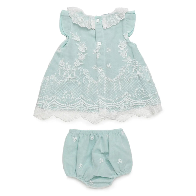 Rear view of the Juliana green lace dress.