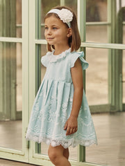 Girl modelling the Juliana lace dress.