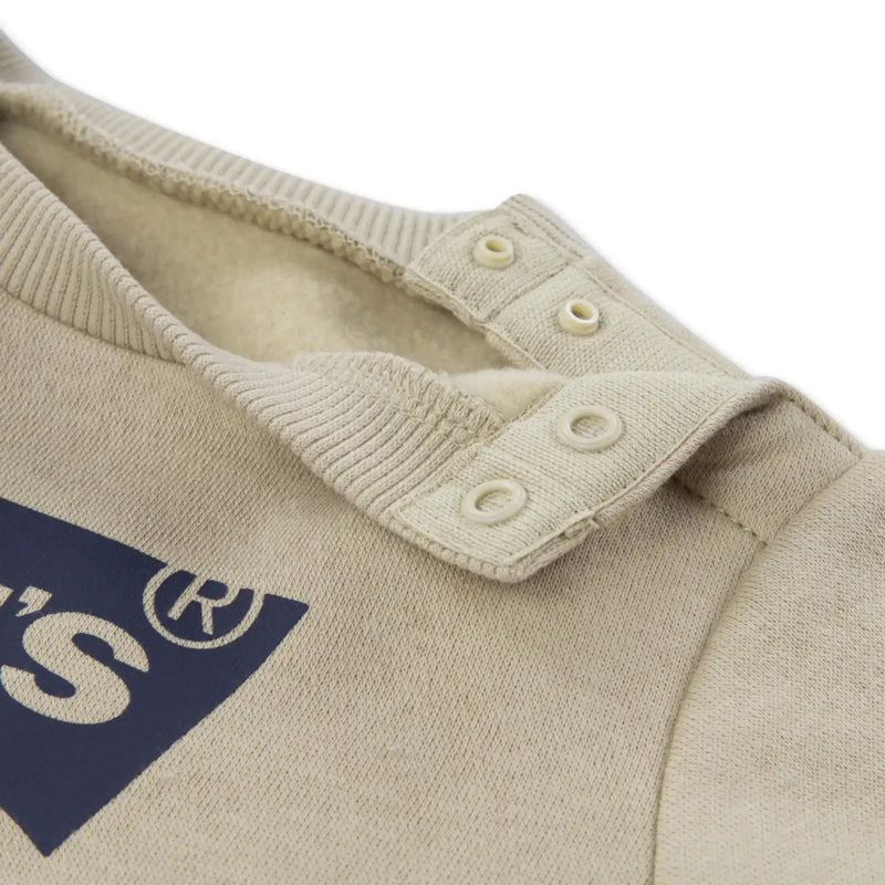 Levi's batwing sweatshirt with button fasteners at the shoulder.
