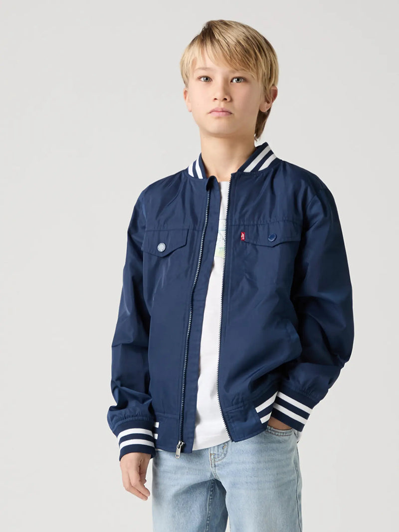 Boy modelling the Levi's bomber jacket.