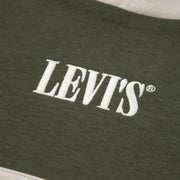 Closer look at the Levi's colourblock tracksuit showing detail of the embroidered logo on the chest.