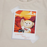 Levi's beige t-shirt with teddy bear print.