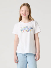 Girl wearing the Levi's floral logo t-shirt.