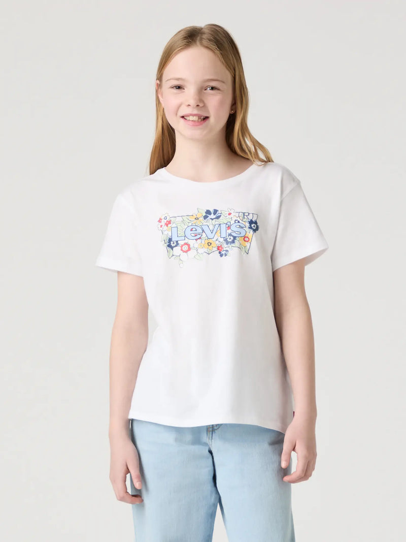 Girl wearing the Levi's floral logo t-shirt.