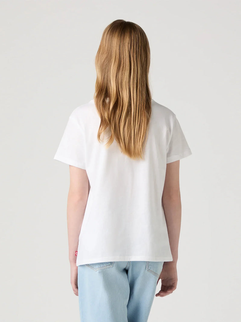 Girl modelling the Levi's floral logo t-shirt.