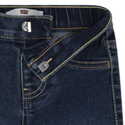 Closer view of the Levi's dark wash jeans.