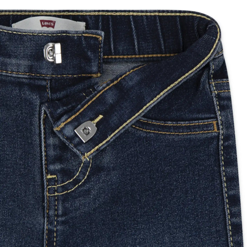 Closer view of the Levi's dark wash jeans.