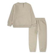 Rear view of the Levi's beige mini logo tracksuit.