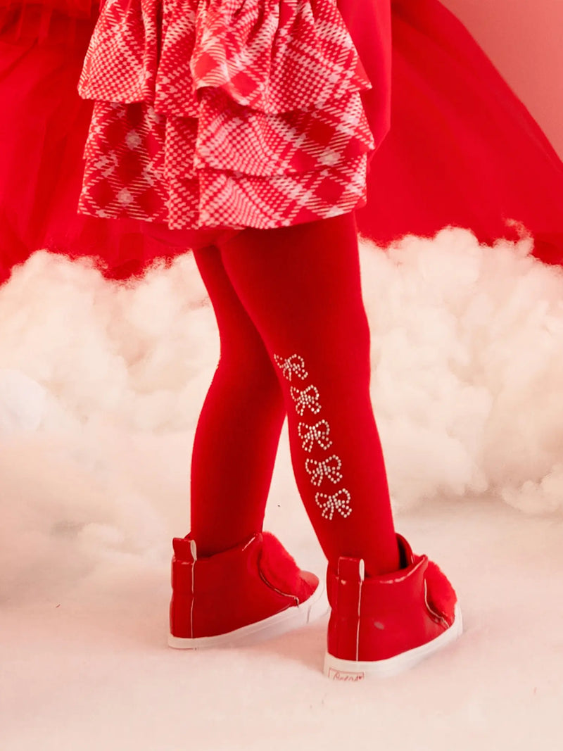 Little A kamila tights with rows of silver diamante bows on the back.