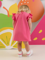 Rear view of the Little A pink paisley dress.