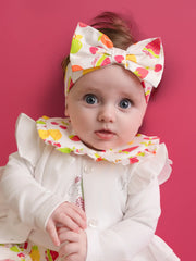 Baby girl wearing the Little A piper headband.