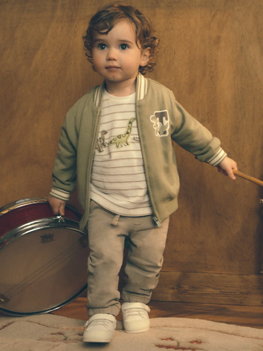 Baby boy wearing the Mayoral baseball jacket.
