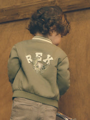 Mayoral baseball jacket with a large dinosaur logo on the back.