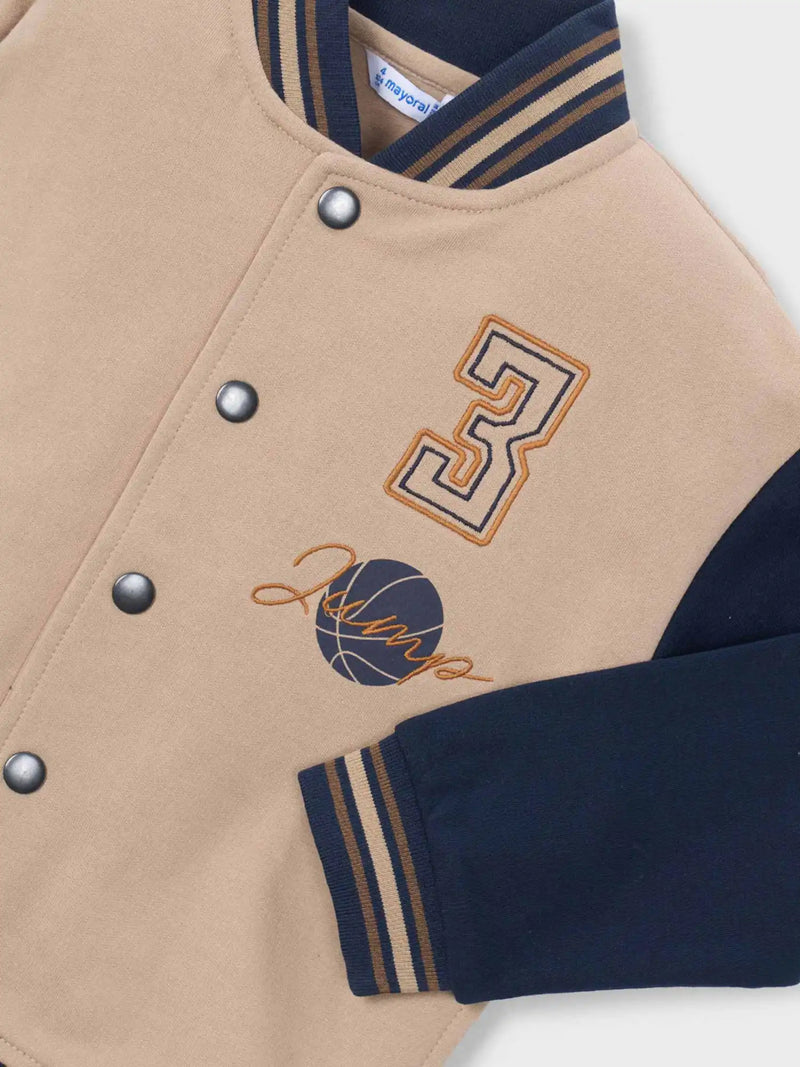 Closer view of the Mayoral baseball jacket.