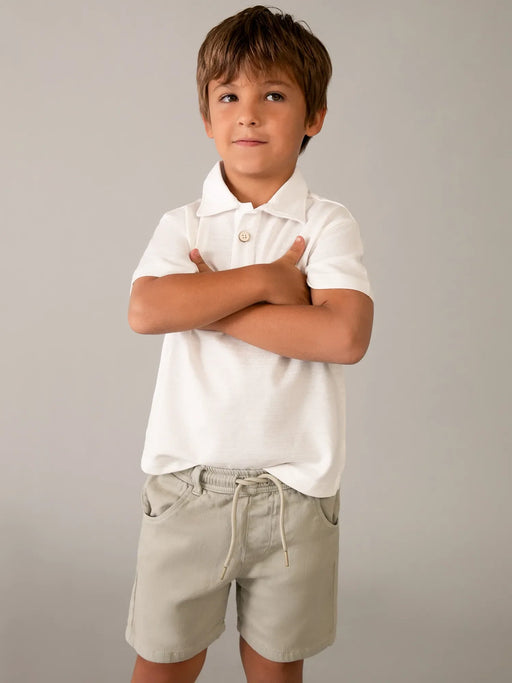 Boy wearing the Mayoral bermuda shorts.