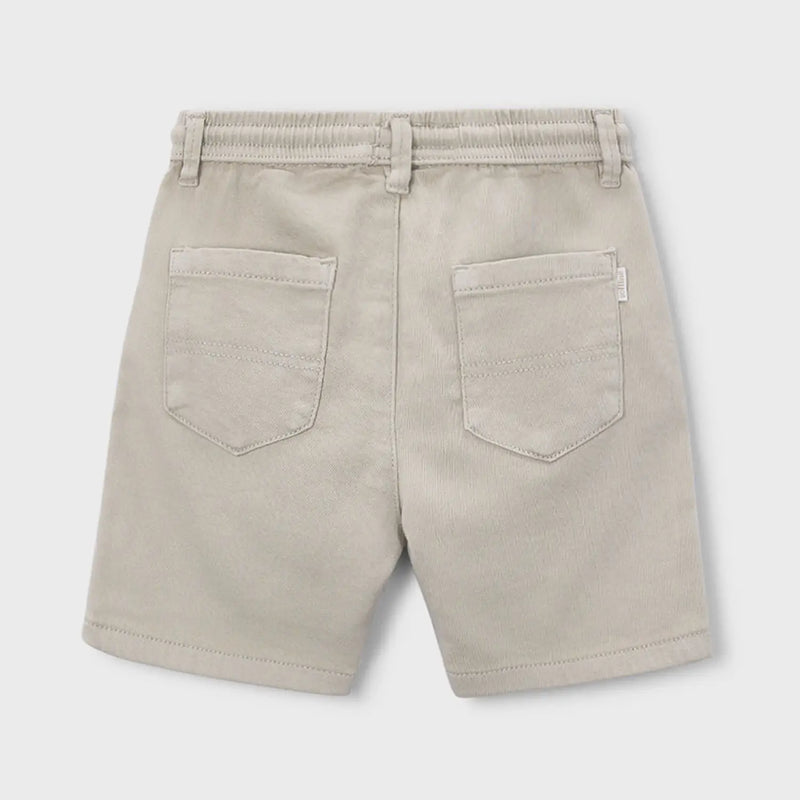 Rear view of the Mayoral beige bermuda shorts.