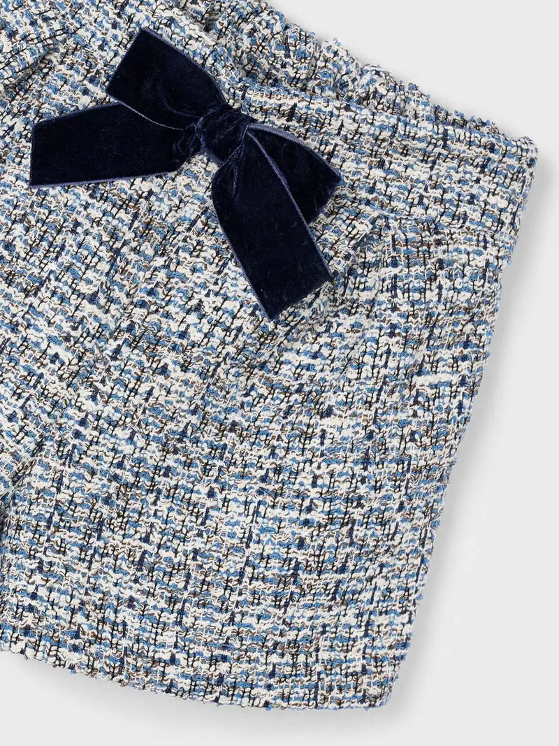 Closer view of the Mayoral tweed shorts.