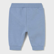 Newborn boy's blue track bottoms.