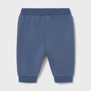 Newborn boy's dark blue track bottoms.