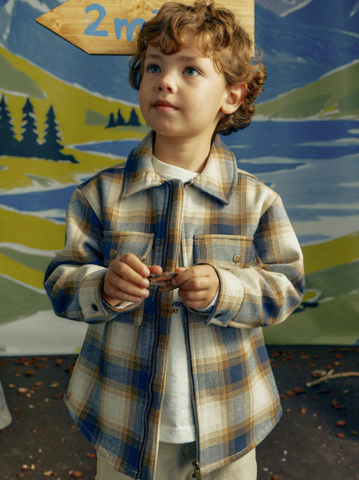 Boy wearing the Mayoral checked jacket.