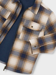 Closer look at the Mayoral checked jacket showing detail of the warm inner lining.
