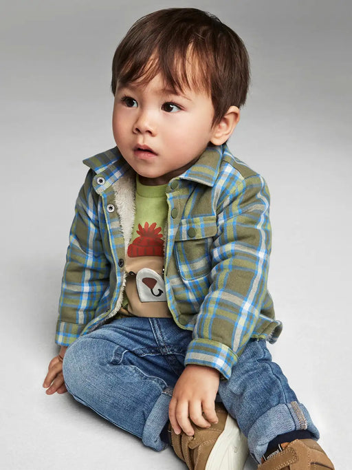 Baby boy modelling the Mayoral check overshirt.