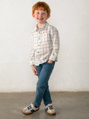 Smiling Boy modelling the Mayoral checked shirt.