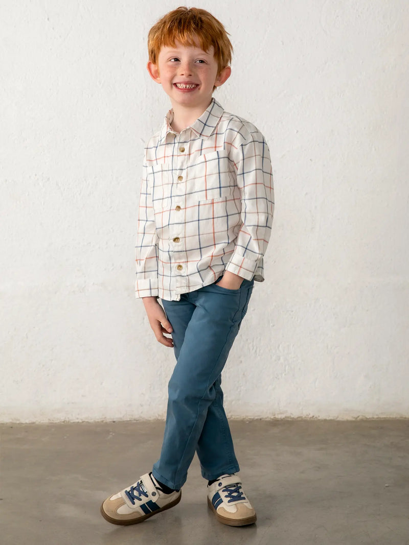 Smiling Boy modelling the Mayoral checked shirt.