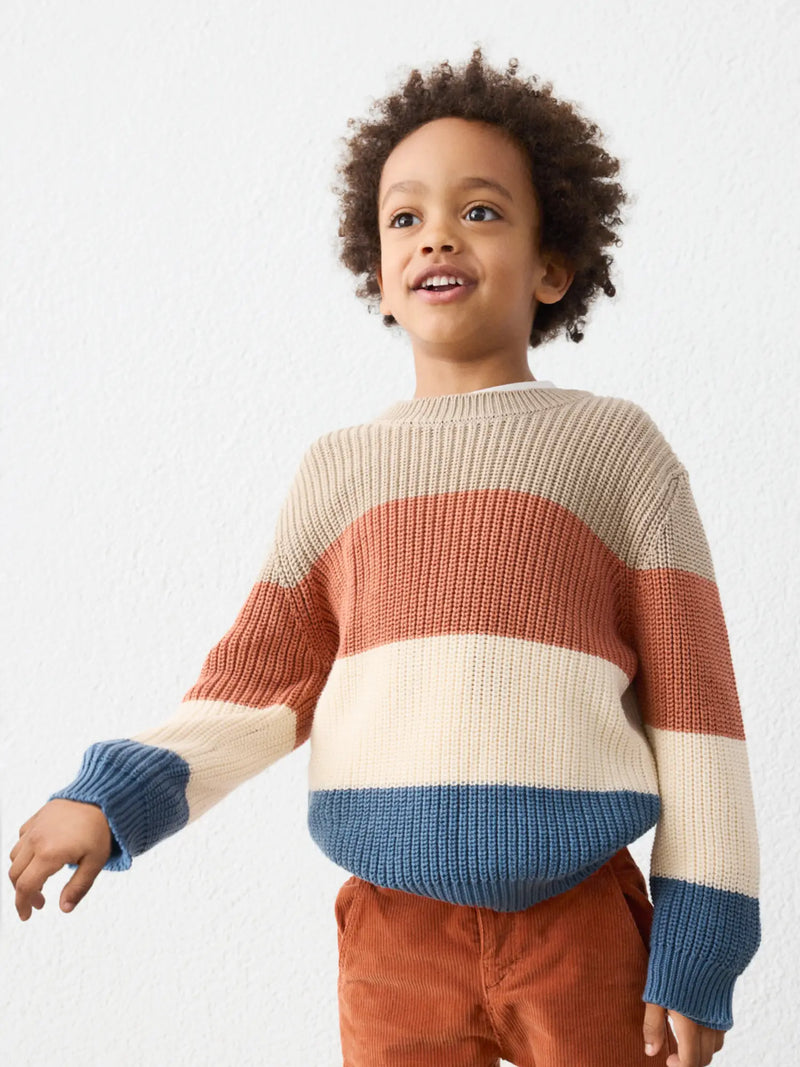 Boy wearing the Mayoral colourblock jumper.