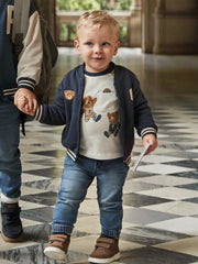 Baby boy wearing the Mayoral denim joggers.