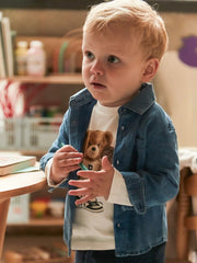 Baby boy wearing the Mayoral denim shirt.