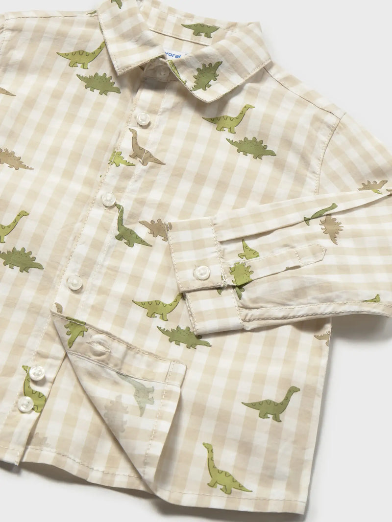 Closer view of the Mayoral dinosaur shirt.