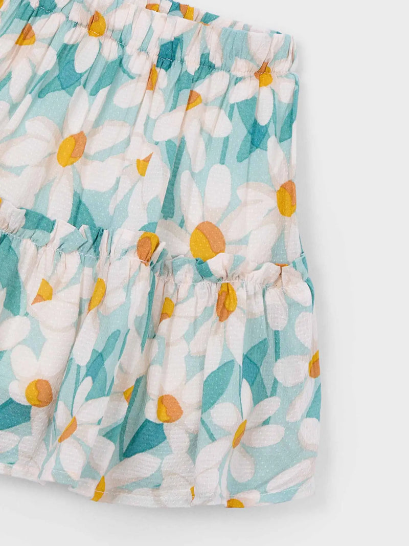 Tiered skirt with all over pattern of sunny summer daisies.
