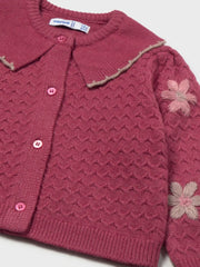 Closer look at the Mayoral embroidered cardigan showing detail of the floral embroidery on the sleeves.